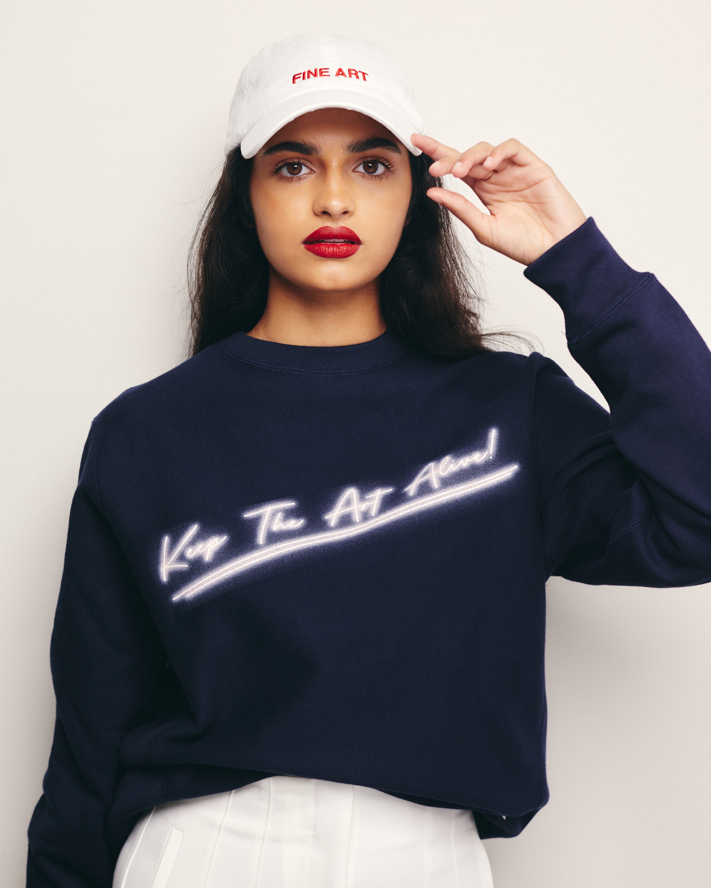 Mira Bhat wears Navy / Blue Neon Keep The Art Alive Printed Heavyweight Sweatshirt/ Crewneck Tracey Emin Neon Inspired