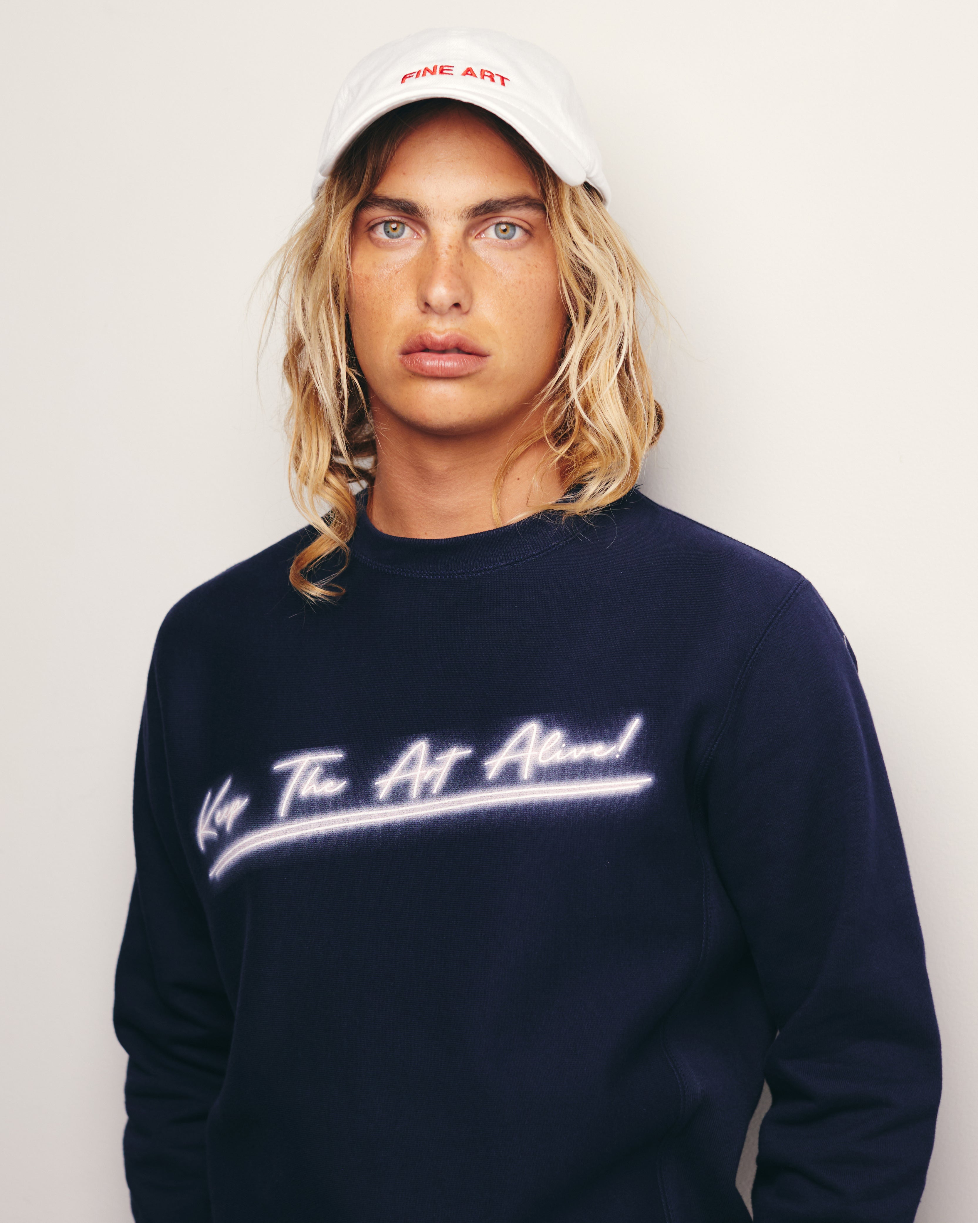 Lucas Ucedo wears Navy / Blue Neon Keep The Art Alive Printed Heavyweight Sweatshirt/ Crewneck Tracey Emin Neon Inspired