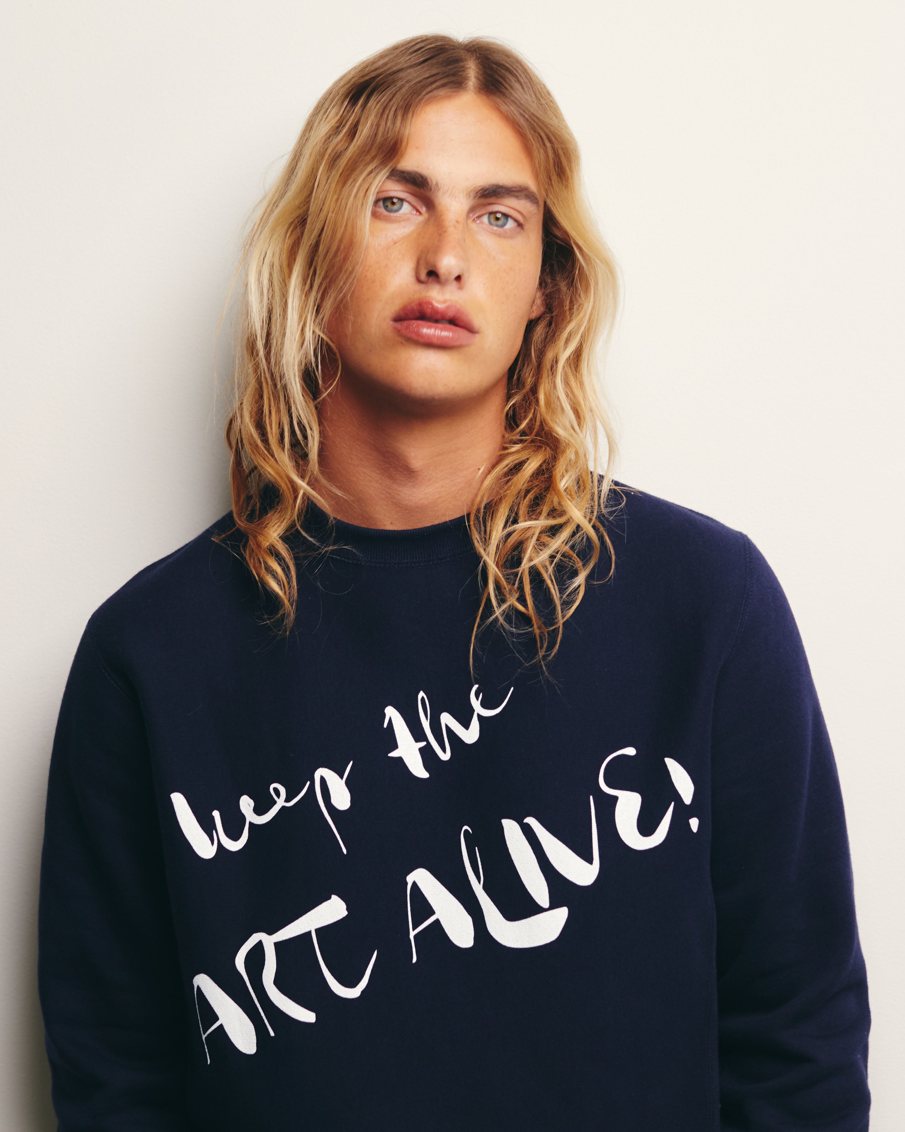 Lucas Ucedo wears Navy / Blue Keep The Art Alive New Wave Printed Heavyweight Sweatshirt/ Crewneck French New Wave Inspired