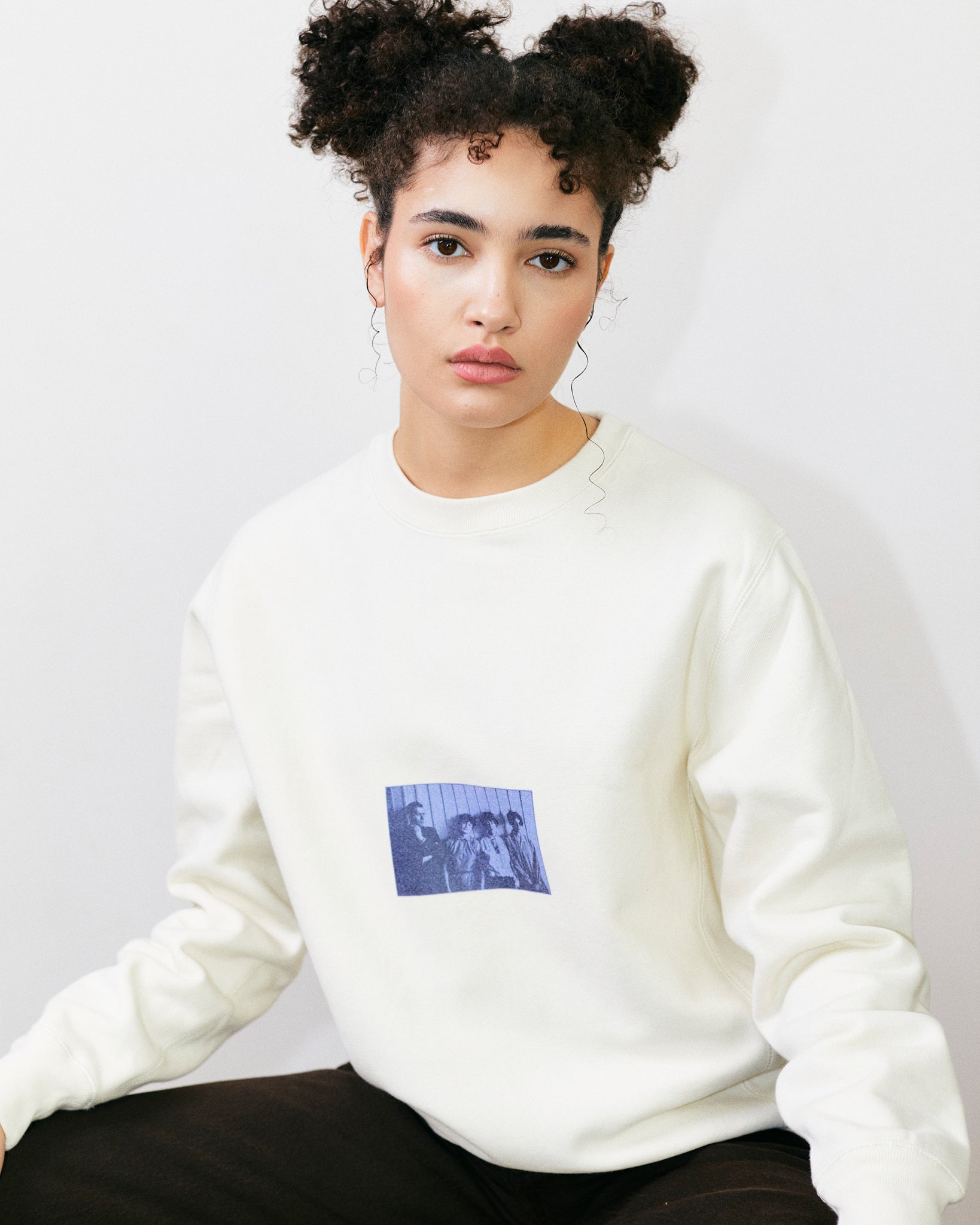 Teo Marcella Wears Heavyweight Off White Crewneck Sweatshirt Tee With Print Of Photograph Of Bauhaus Students Marcel Breuer, Marta Erps-Breuer, Katt Both And Ruth Hollos-Consemüller In 1927 Modernism Art Movement