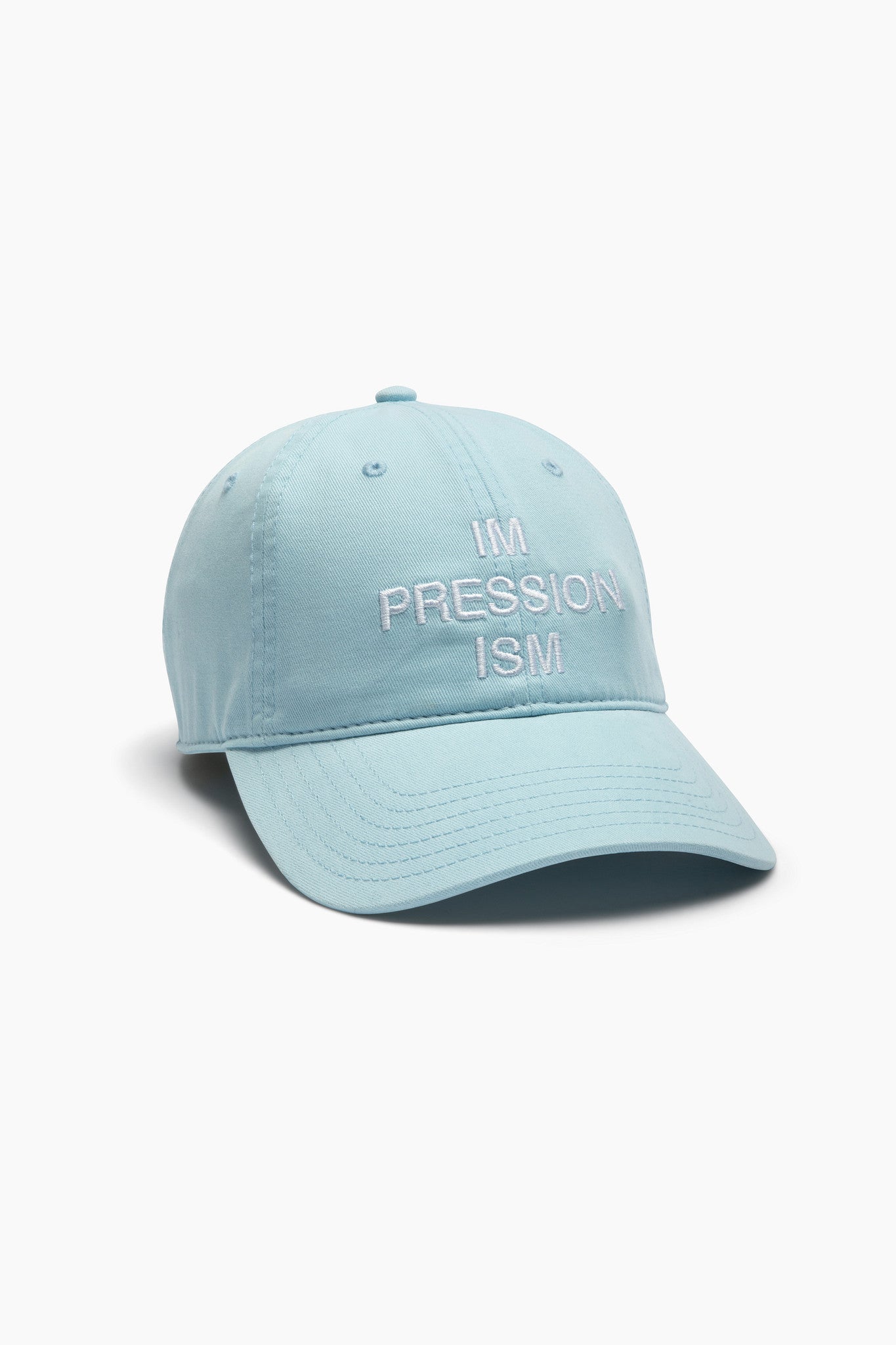 Light blue cap with text on a white background