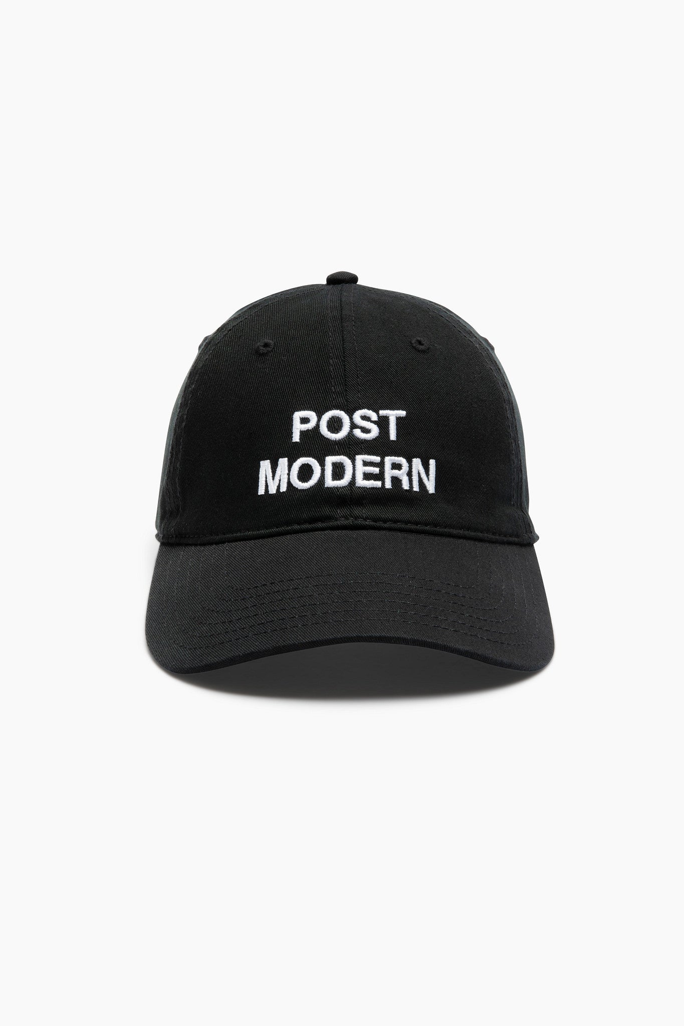 Black cap with 'POST MODERN' text on it