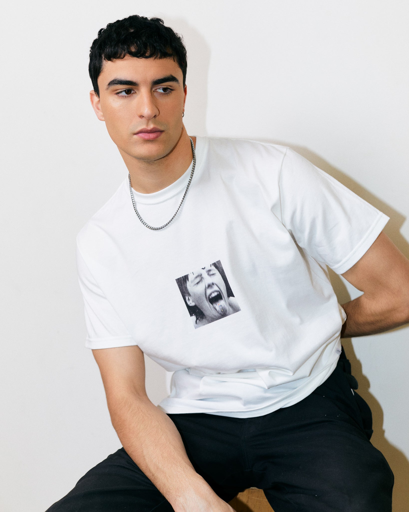 Arjang Mahdavi Wears 100% Cotton White Tee with Bauhaus Girl Student with Tongue Out and Bauhaus Graphic Text.